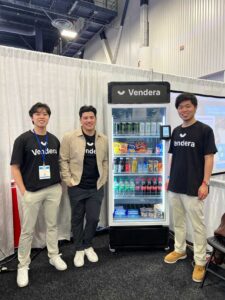 From left to right, UVA alumni Alfred Udquim, Auston Wallace and Kenneth Lin display their Vendera machine. The Class of 2019 trio met at the McIntire School of Commerce and are now running a startup business together. (Contributed photo)