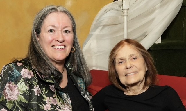 Dot Kelly sitting beside Gloria Steinem