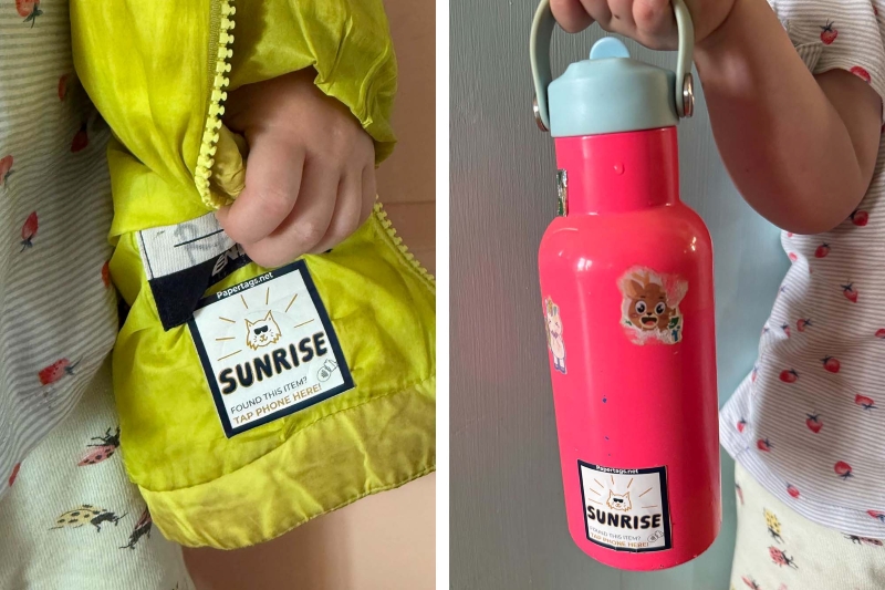 tags displayed on a jacket and a water bottle