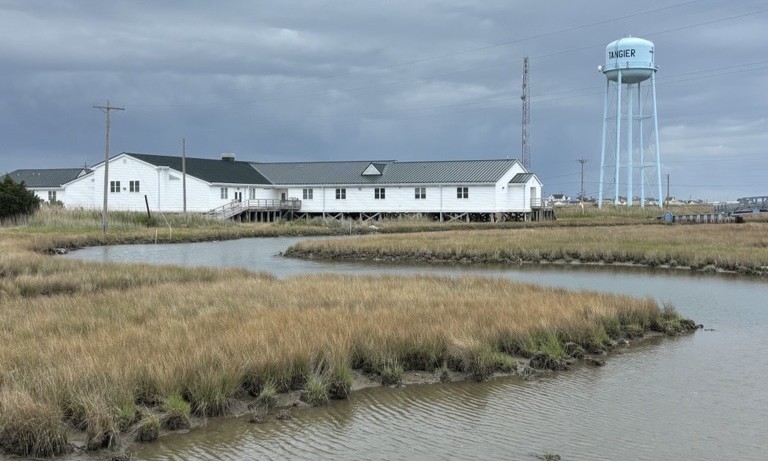 creek, water tower, and building on Tangier Island