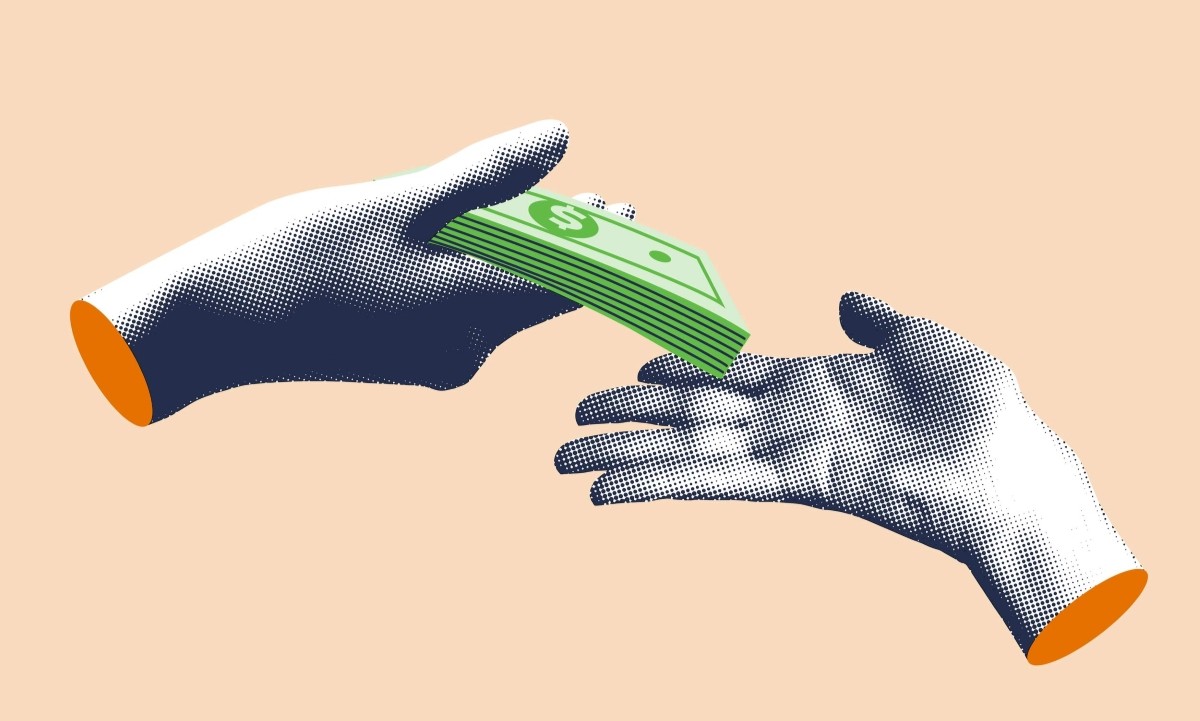 two hands exchanging money